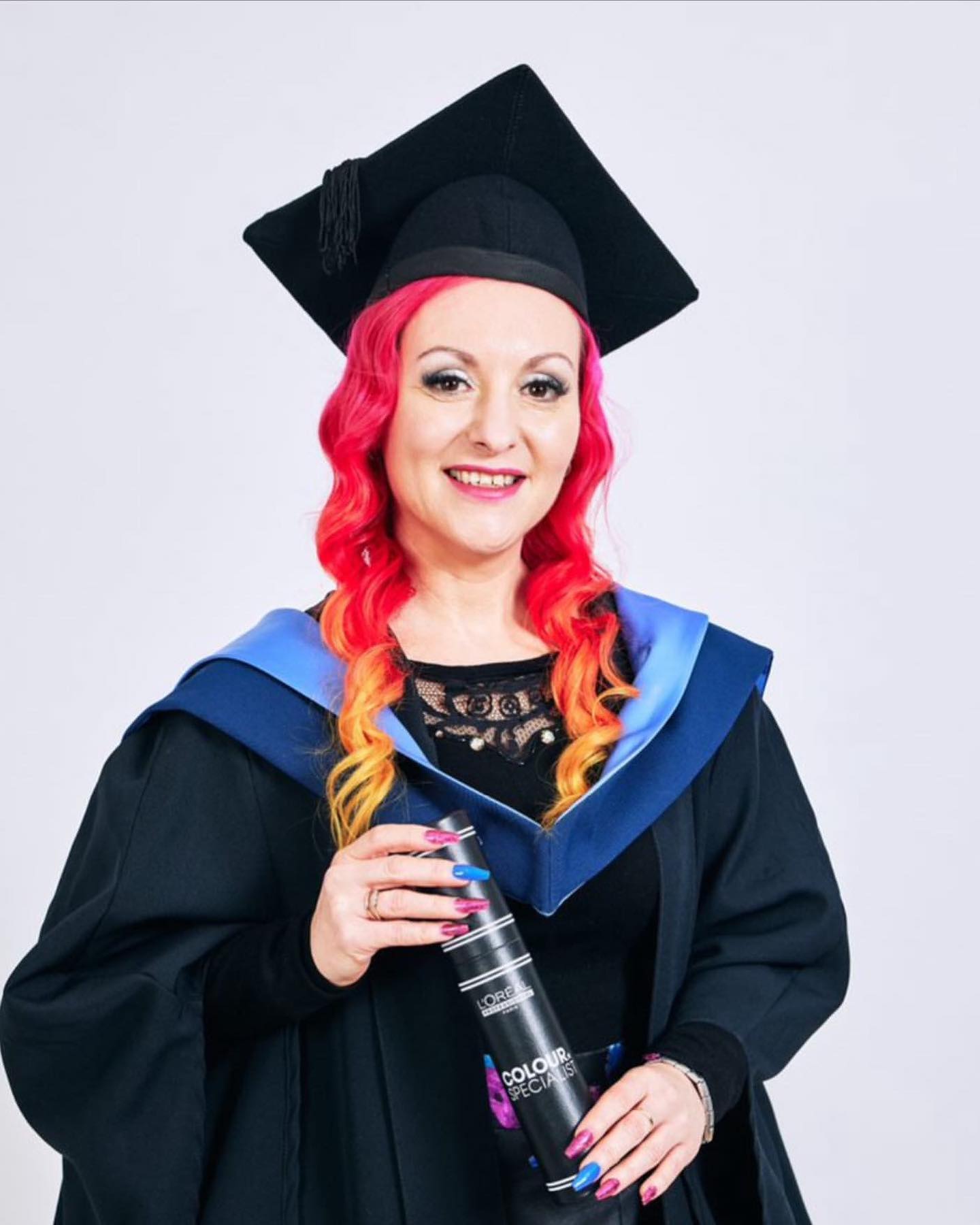Emma from Saks Hexham graduating the colour degree.