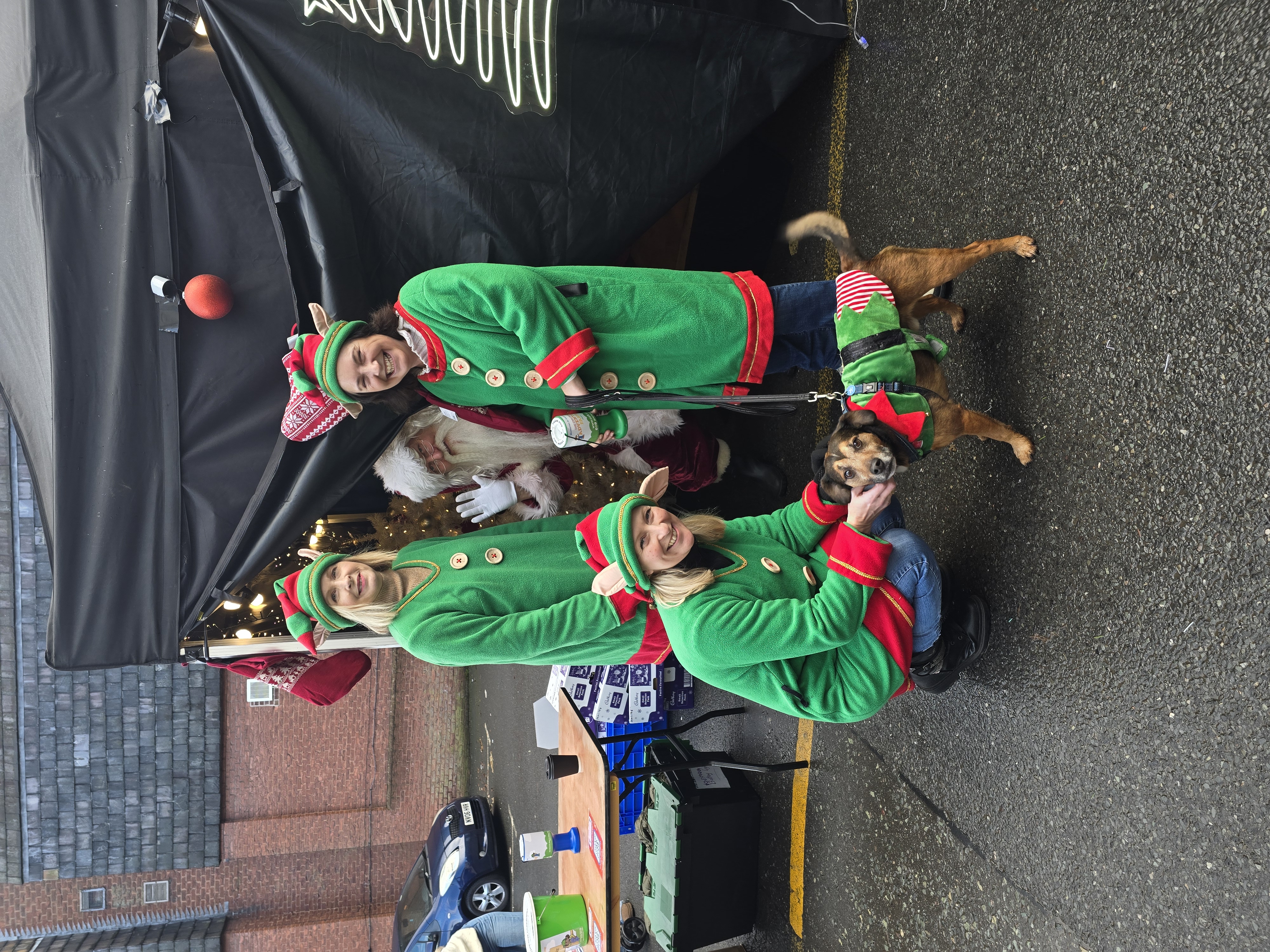 Salon owner of Saks Knutsford with a friend, volunteering at a Christmas Fayre