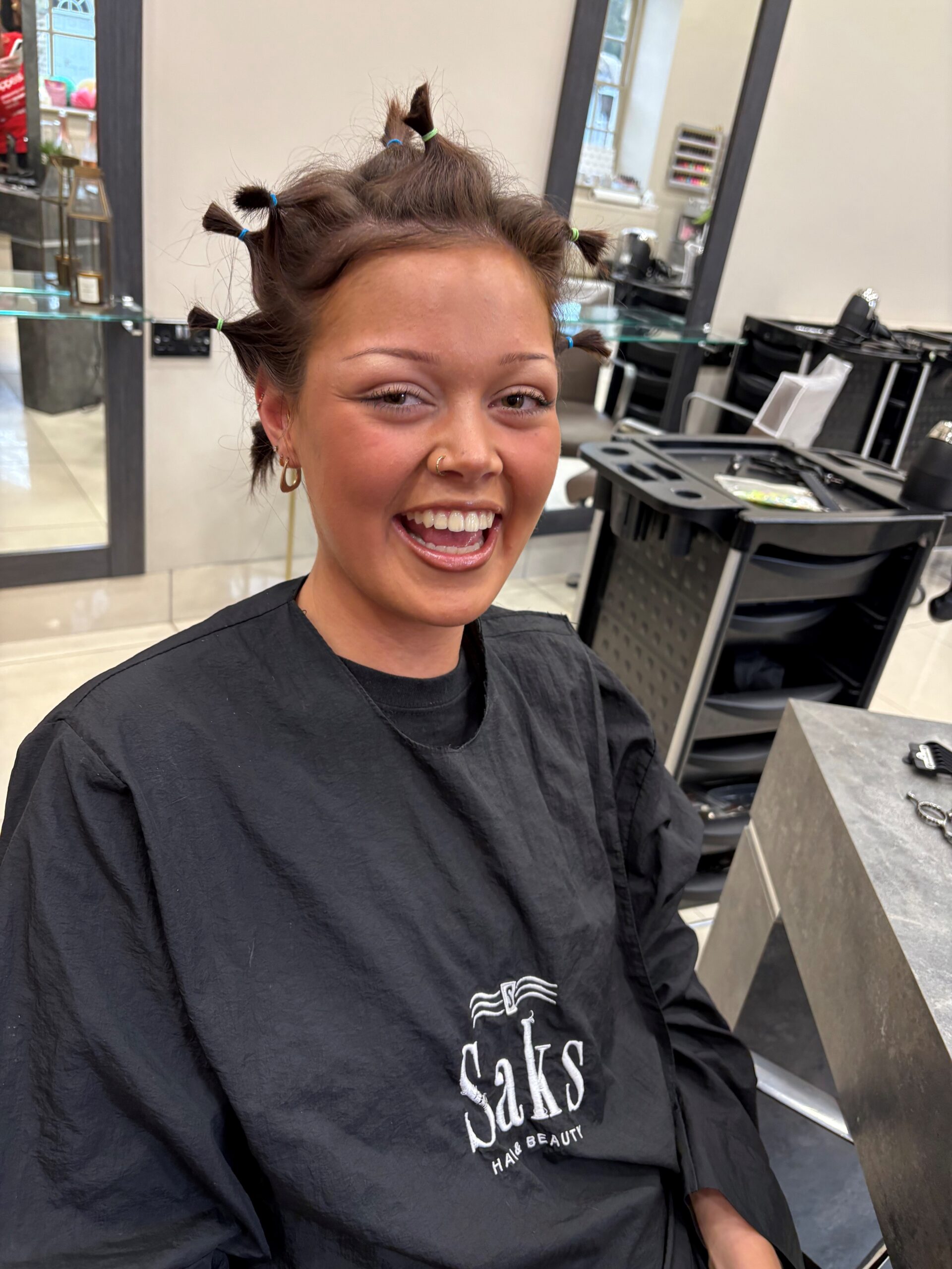 Izzy of Saks Hair & Beauty Sedbury Hall sporting her short hair ready to be shaved for charity